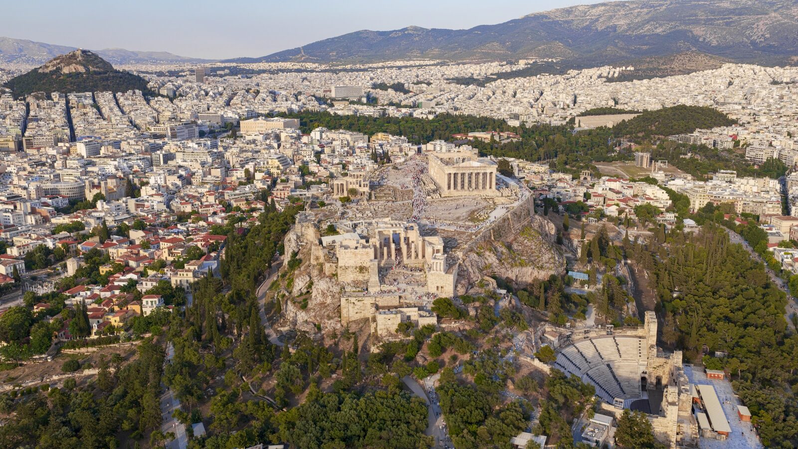 The Parthenon temple atop the Acropolis in Athens at golden hour