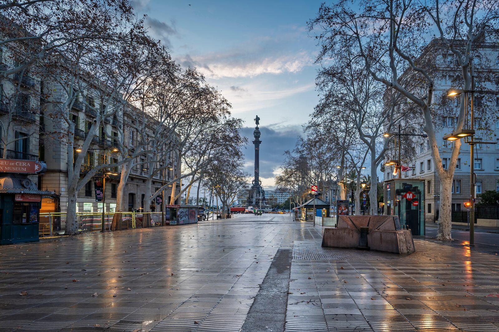 Strollers and flower stalls along La Rambla boulevard in Barcelona