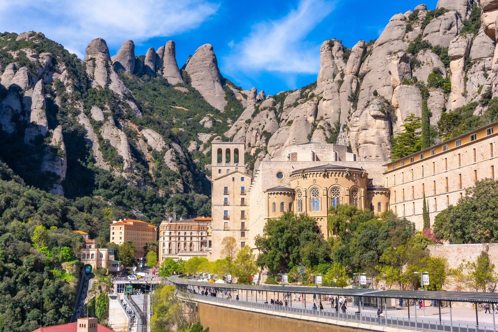 The monastery of Montserrat below the serrated mountain peaks near Barcelona