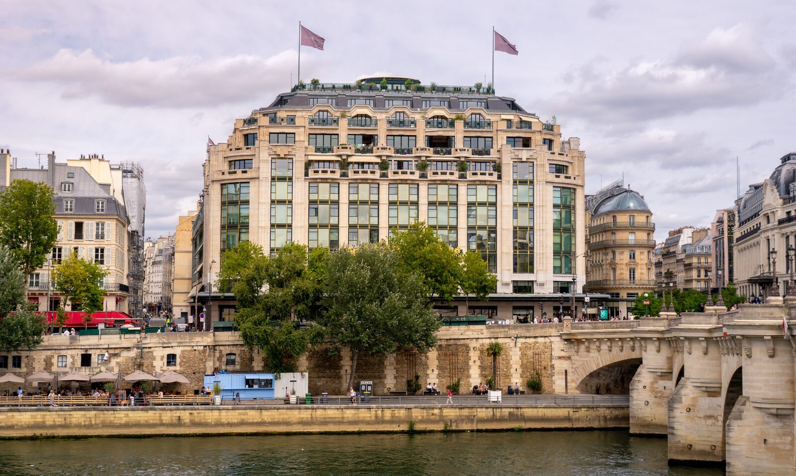A luxury Paris hotel terrace with a view toward the Eiffel Tower
